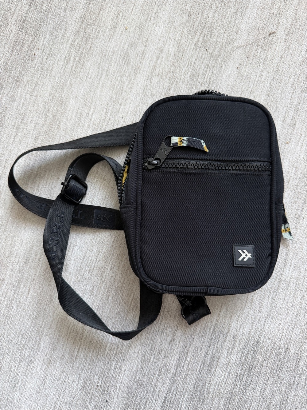 Black Compact Crossbody Belt Bag with Subtle Logo